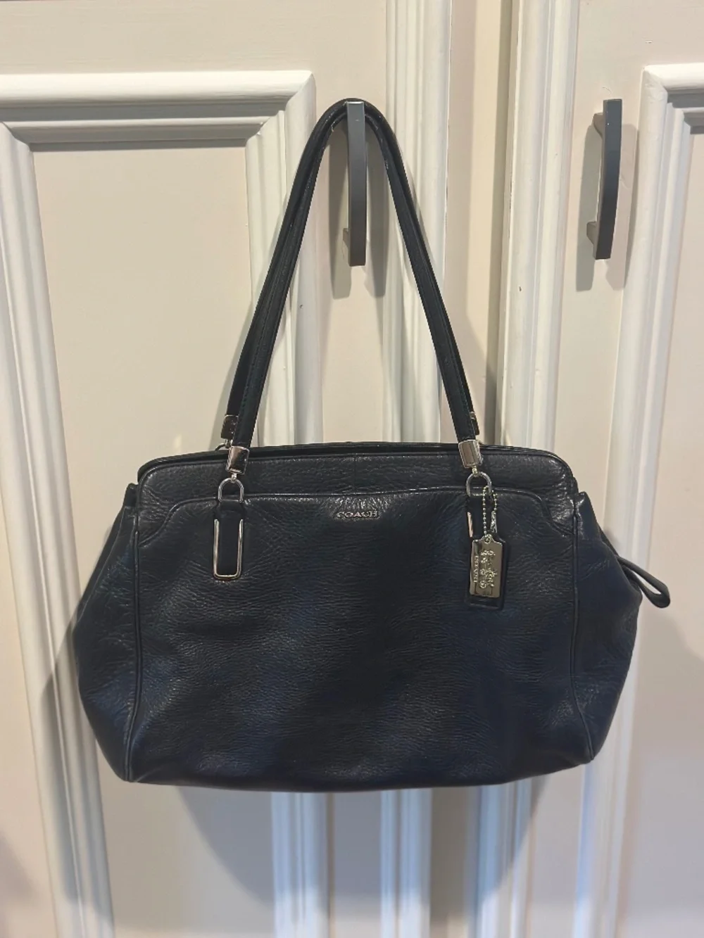 Coach bag black with nay inside
